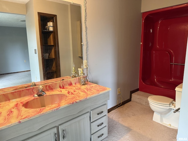 15 Dunn Ln, Goreville, IL 62939 - bathroom featuring vanity, toilet, baseboards, and a shower