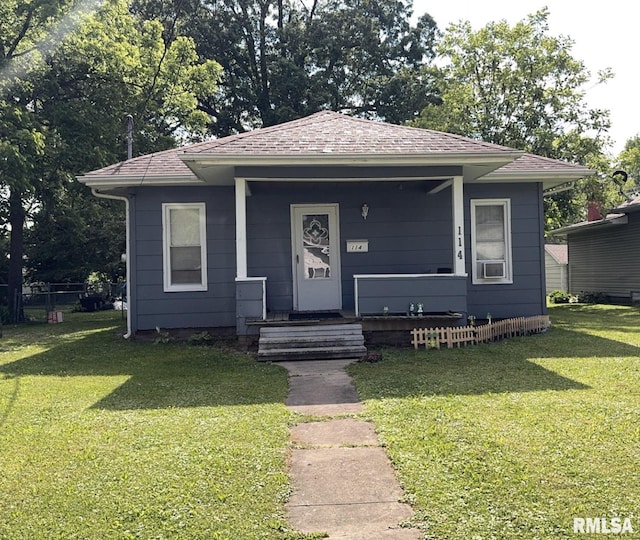 114 S 9th St, Benton, IL 62812 - bungalow-style house with a front lawn, roof with shingles, and covered porch