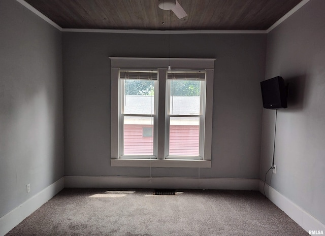 704 S Washington St, Mcleansboro, IL 62859 - unfurnished room featuring ornamental molding, carpet, ceiling fan, wooden ceiling, and baseboards