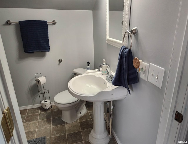 704 S Washington St, Mcleansboro, IL 62859 - half bathroom with toilet and baseboards