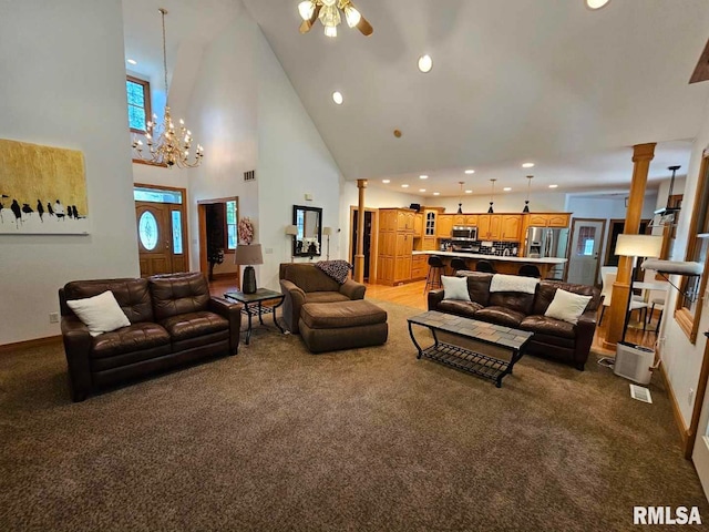 9 Fawn Dr, Fairfield, IL 62837 - living room with carpet flooring, recessed lighting, a high ceiling, ceiling fan, and ornate columns