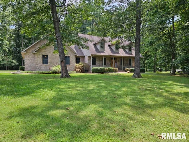 9 Fawn Dr, Fairfield, IL 62837 - cape cod-style house with a front yard and a porch