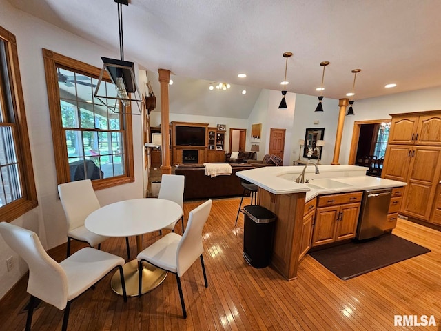 9 Fawn Dr, Fairfield, IL 62837 - kitchen featuring stainless steel dishwasher, a sink, recessed lighting, a kitchen island with sink, and light countertops