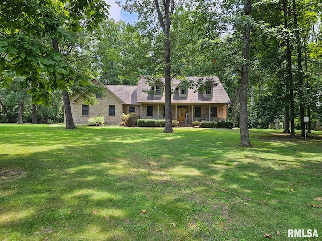 9 Fawn Dr, Fairfield, IL 62837 - cape cod house featuring a front yard and a porch