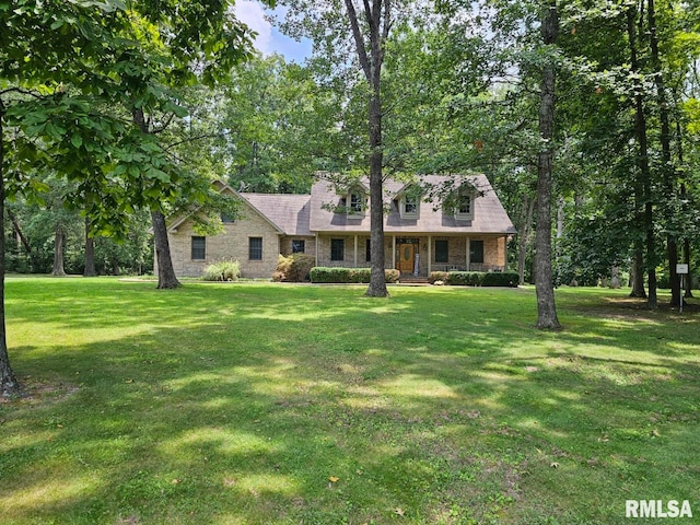 9 Fawn Dr, Fairfield, IL 62837 - cape cod home with a front lawn and a porch