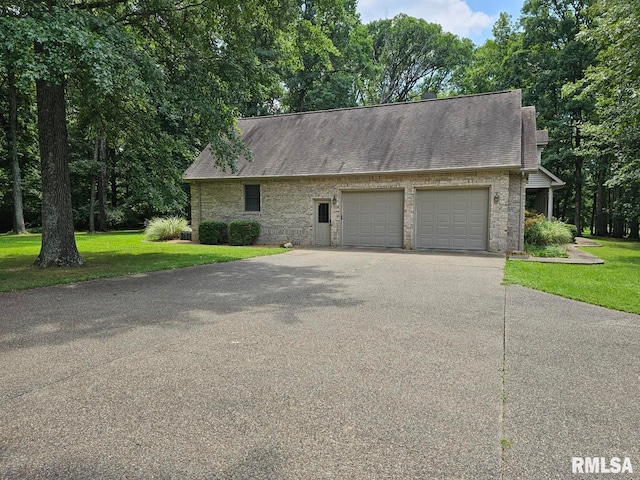 9 Fawn Dr, Fairfield, IL 62837 - view of front of property featuring driveway, a front lawn, a garage, and roof with shingles
