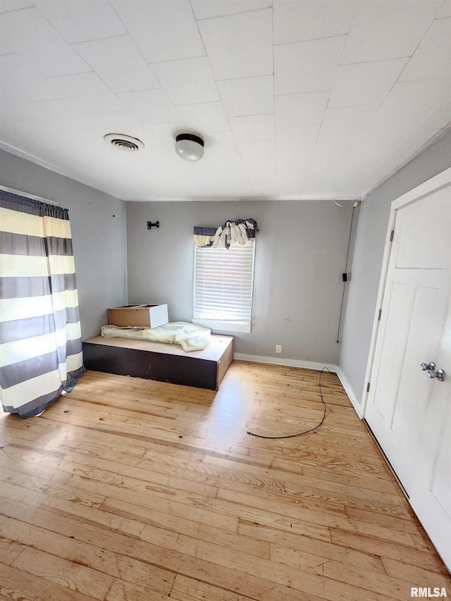 528 N 15th St, Murphysboro, IL 62966 - bedroom with multiple windows, hardwood / wood-style flooring, and baseboards