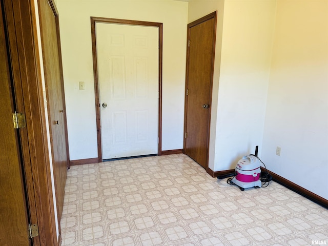 3685 Lick Creek Rd, Anna, IL 62906 - unfurnished bedroom with baseboards and light floors