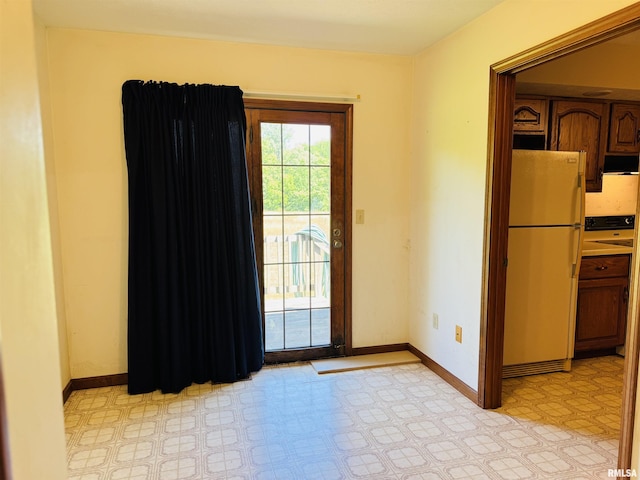 3685 Lick Creek Rd, Anna, IL 62906 - doorway to outside featuring baseboards and light flooring