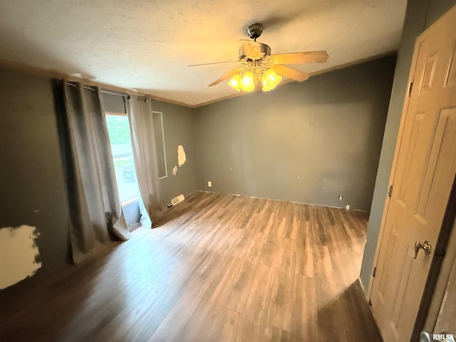45 White Sands Rd, Creal Springs, IL 62922 - unfurnished room featuring wood finished floors and ceiling fan