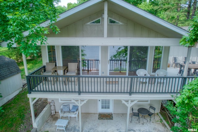 1150 Lakeview Dr, Creal Springs, IL 62922 - rear view of house with board and batten siding and a deck