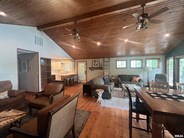 1150 Lakeview Dr, Creal Springs, IL 62922 - living area featuring ceiling fan, light wood-style floors, wood ceiling with exposed beams, and high vaulted ceiling