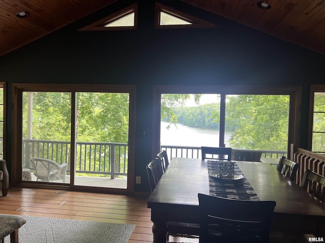 1150 Lakeview Dr, Creal Springs, IL 62922 - dining space with vaulted ceiling, wooden ceiling, a water view, and hardwood / wood-style floors