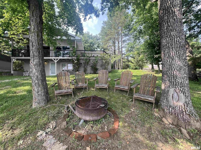 1150 Lakeview Dr, Creal Springs, IL 62922 - view of grassy yard featuring a fire pit and a deck