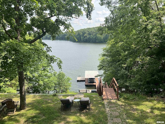 1150 Lakeview Dr, Creal Springs, IL 62922 - view of yard with a water view, a floating dock, and a wooded view