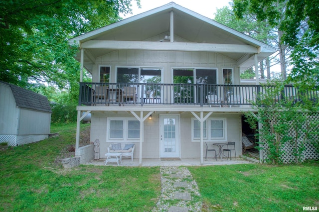 1150 Lakeview Dr, Creal Springs, IL 62922 - rear view of house featuring a lawn, a deck, and a patio