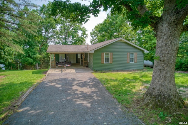 1150 Lakeview Dr, Creal Springs, IL 62922 - single story home with driveway, a front yard, and an attached carport