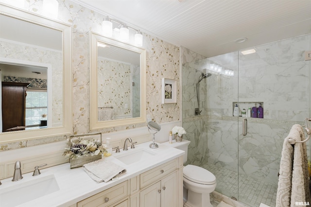 12897 Egypt Shores Dr, Creal Springs, IL 62922 - bathroom with wallpapered walls, a marble finish shower, double vanity, toilet, and ornamental molding