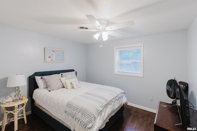 12897 Egypt Shores Dr, Creal Springs, IL 62922 - bedroom with wood finished floors, baseboards, and ceiling fan