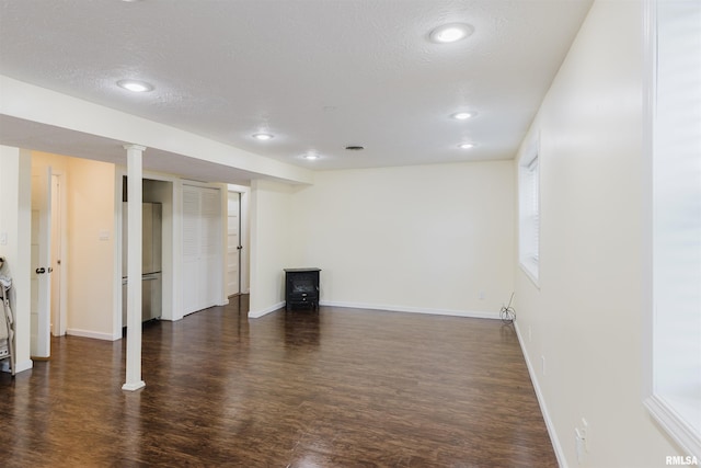 12897 Egypt Shores Dr, Creal Springs, IL 62922 - finished basement with dark wood-style floors, baseboards, a textured ceiling, and recessed lighting