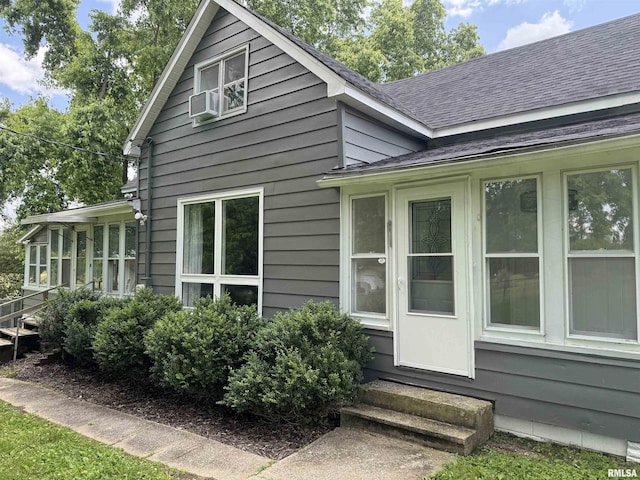 6984 Washington St, Mulkeytown, IL 62865 - view of property exterior featuring entry steps and roof with shingles