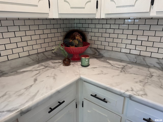 6984 Washington St, Mulkeytown, IL 62865 - kitchen view of backsplash, light countertops, and white cabinets
