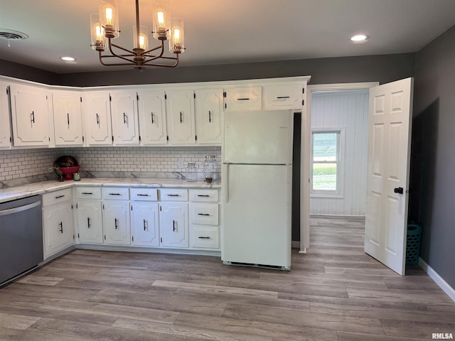 6984 Washington St, Mulkeytown, IL 62865 - kitchen featuring freestanding refrigerator, dishwasher, a chandelier, white cabinets, and recessed lighting