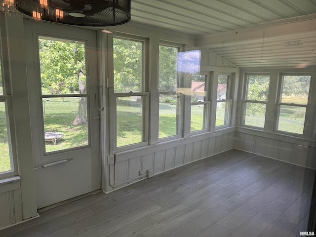 6984 Washington St, Mulkeytown, IL 62865 - unfurnished sunroom featuring wood-type flooring and plenty of natural light
