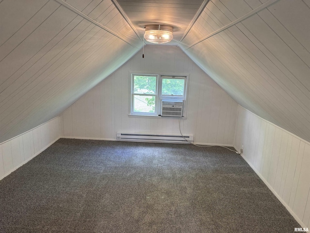 6984 Washington St, Mulkeytown, IL 62865 - additional living space featuring a baseboard radiator, vaulted ceiling, cooling unit, carpet flooring, and wood walls