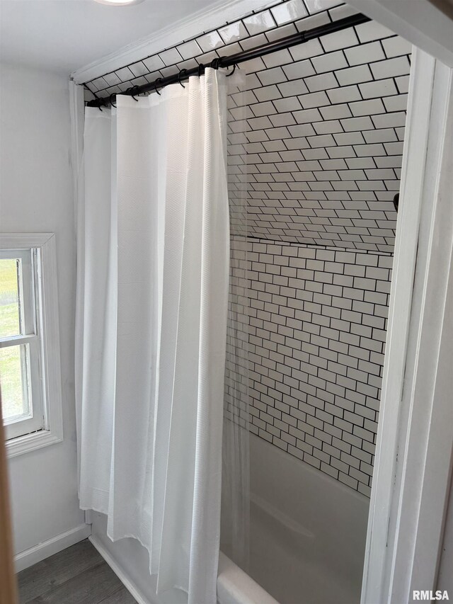 6984 Washington St, Mulkeytown, IL 62865 - full bath featuring shower / tub combo, baseboards, and wood finished floors