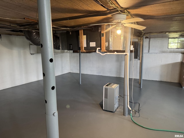 6984 Washington St, Mulkeytown, IL 62865 - basement with concrete block wall and a ceiling fan