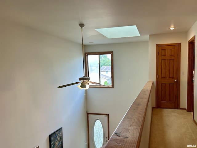 108 N Gordon Ln, Carbondale, IL 62901 - hallway featuring a skylight and light carpet