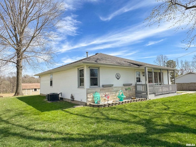 310 Williford Rd, Jonesboro, IL 62952 - back of house featuring a yard and central AC