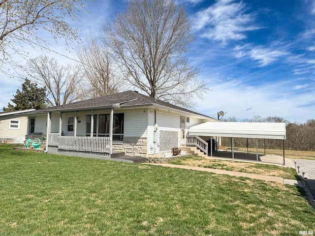 310 Williford Rd, Jonesboro, IL 62952 - rear view of property featuring a porch, a lawn, a carport, and stone siding