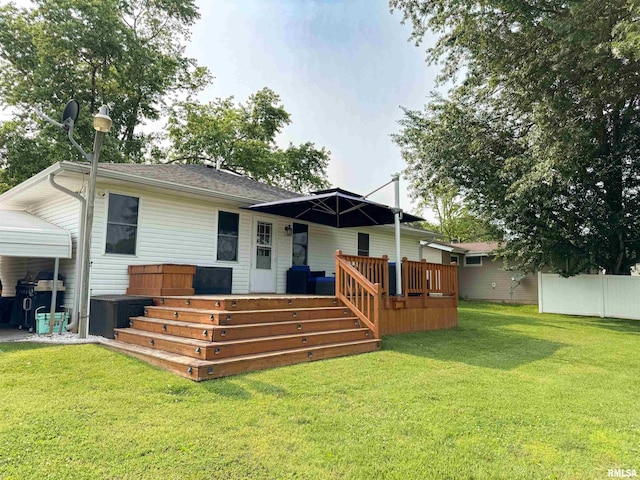 310 Williford Rd, Jonesboro, IL 62952 - back of property with a wooden deck and a lawn