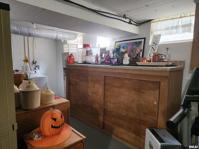 605 Pace Ave, Mount Vernon, IL 62864 - below grade area featuring concrete block wall and washer / dryer
