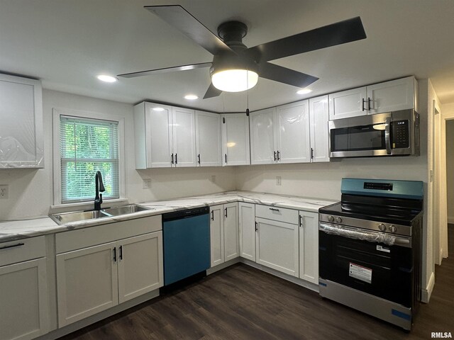1924 N 7th St, Murphysboro, IL 62966 - kitchen with appliances with stainless steel finishes, a sink, white cabinetry, and recessed lighting