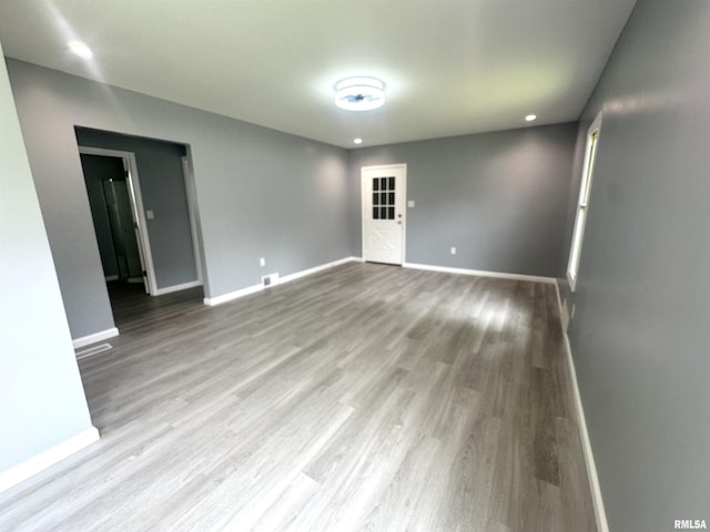 1206 E 2nd St, Centralia, IL 62801 - unfurnished room featuring baseboards, wood finished floors, and recessed lighting