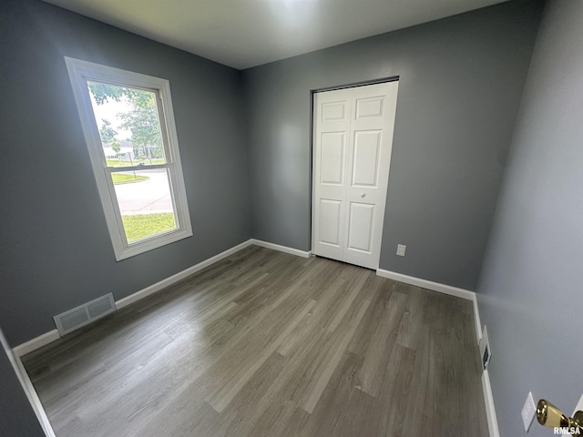 1206 E 2nd St, Centralia, IL 62801 - spare room with wood finished floors and baseboards