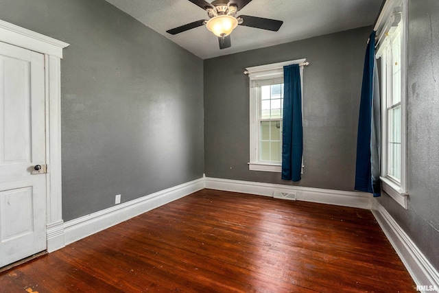 2112 Herbert St, Murphysboro, IL 62966 - unfurnished room with hardwood / wood-style flooring, baseboards, and ceiling fan