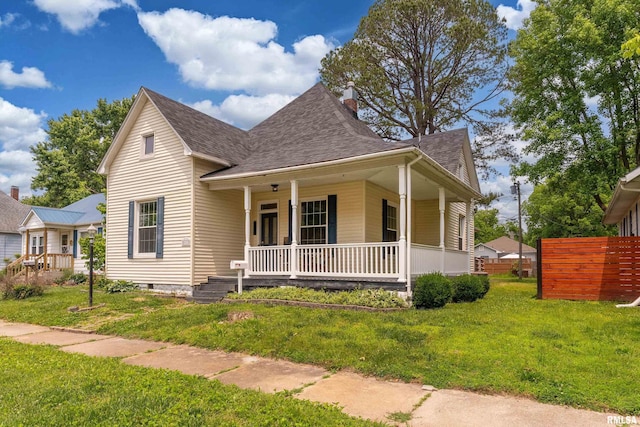 2112 Herbert St, Murphysboro, IL 62966 - view of front facade with a porch, roof with shingles, and a chimney