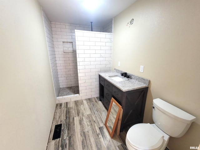 7324 State Route 161st Ext, Iuka, IL 62849 - full bath featuring a walk in shower, toilet, vanity, and wood finished floors