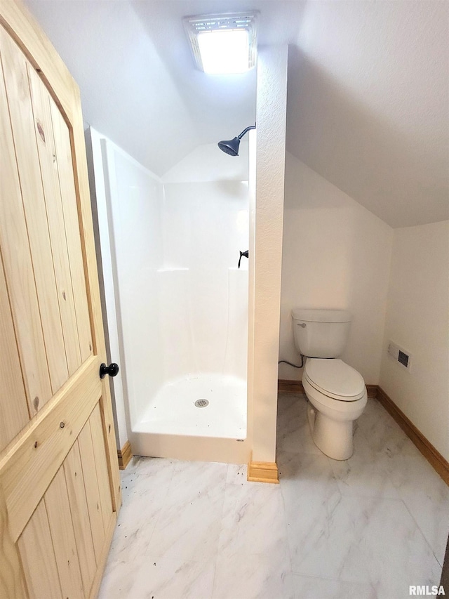 7324 State Route 161st Ext, Iuka, IL 62849 - full bath with lofted ceiling, walk in shower, toilet, baseboards, and marble look tiles
