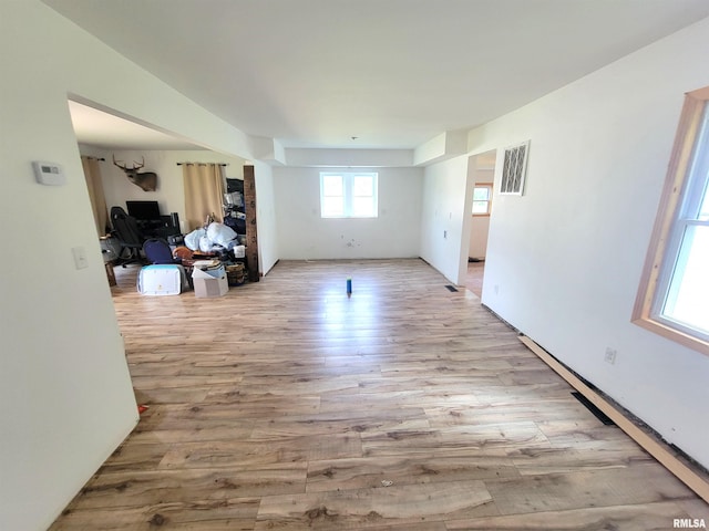 7324 State Route 161st Ext, Iuka, IL 62849 - unfurnished living room with light wood-style floors and a desk