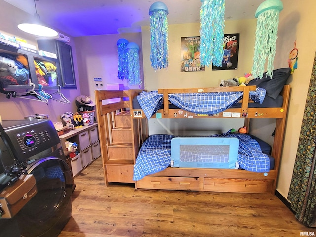 7324 State Route 161st Ext, Iuka, IL 62849 - bedroom with wood finished floors and washer / dryer