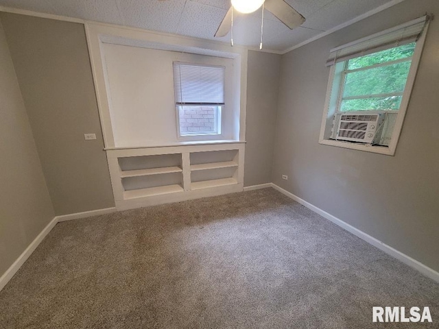 301 N Stotlar St, Benton, IL 62812 - empty room featuring carpet, ceiling fan, and baseboards