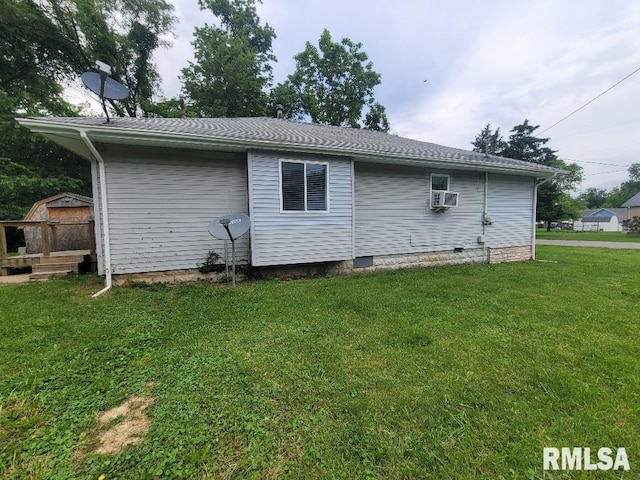 301 N Stotlar St, Benton, IL 62812 - view of property exterior featuring a lawn and cooling unit
