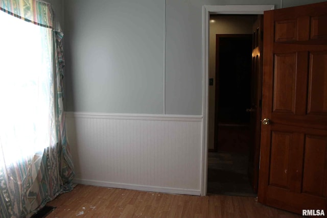 111 Rufus, Mount Vernon, IL 62864 - spare room with light wood finished floors and a wainscoted wall