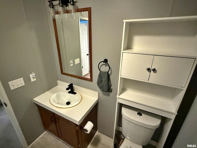 2000 Simmons St, Metropolis, IL 62960 - bathroom with vanity and toilet