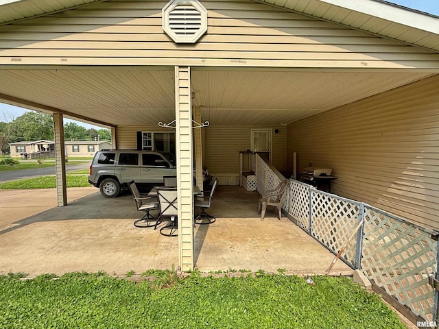 2000 Simmons St, Metropolis, IL 62960 - view of parking / parking lot with an attached carport